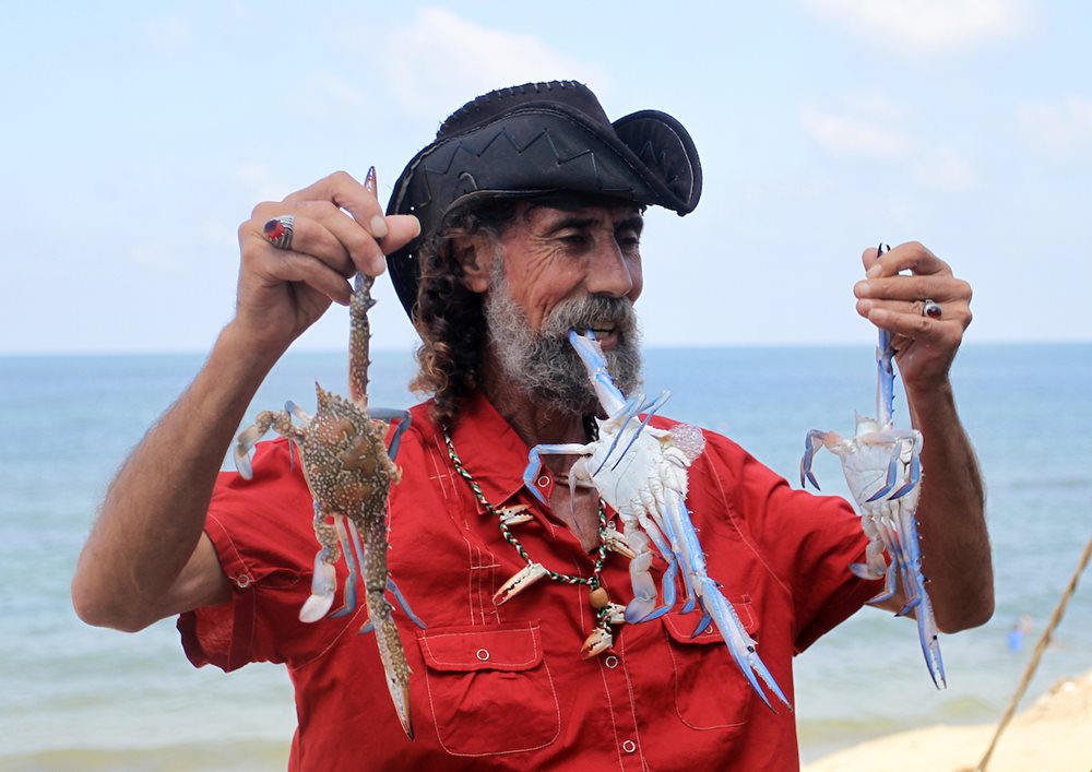 Palestinian fishermen at Al-Shati refugee camp in Gaza City sorted crabs for sale at a fish market on September 25, 2023. Israel's stringent restrictions on Palestinian fishermen's access to the sea, along with frequent attacks and boat confiscations, have severely impacted their livelihoods.
