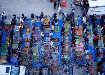 Palestinians hold Eid al-Fitr prayers, in Rafah